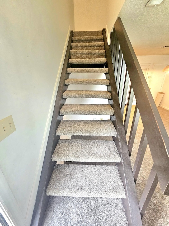 2494 Etiwan Ave Unit 9-D, Charleston, SC 29414 - stairway with a textured ceiling