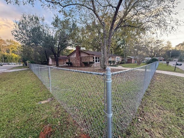 exterior space with a yard