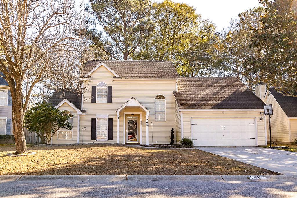 view of property featuring a garage