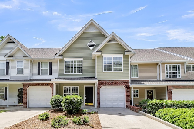 230 Darcy Ave, Goose Creek, SC 29445 - townhome / multi-family property featuring brick siding, driveway, a garage, and a shingled roof