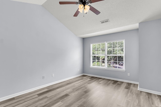 230 Darcy Ave, Goose Creek, SC 29445 - spare room with wood finished floors, a ceiling fan, baseboards, a textured ceiling, and lofted ceiling