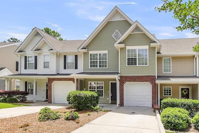 230 Darcy Ave, Goose Creek, SC 29445 - townhome / multi-family property with driveway, brick siding, and an attached garage