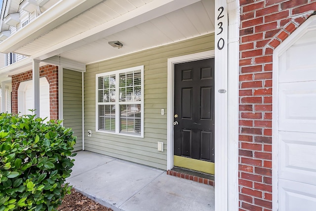 230 Darcy Ave, Goose Creek, SC 29445 - property entrance featuring covered porch and brick siding
