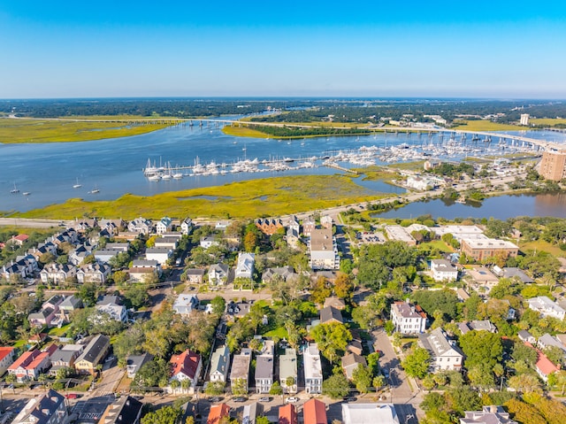 birds eye view of property featuring a water view