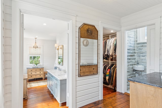 hallway featuring dark hardwood / wood-style floors and ornamental molding