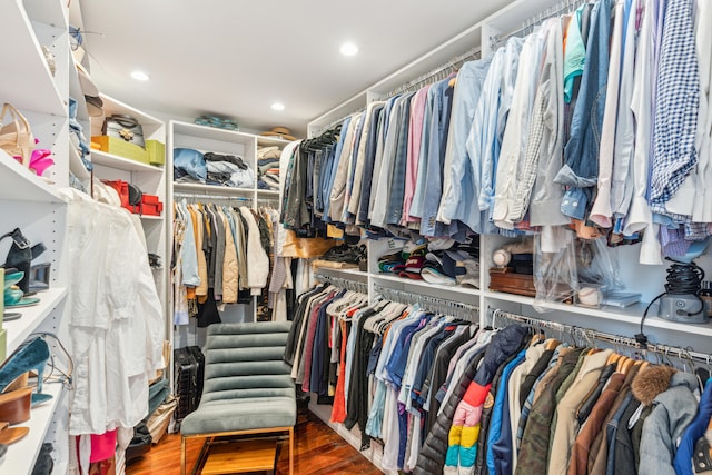 spacious closet featuring hardwood / wood-style floors