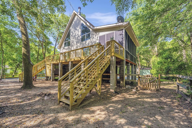 2468 Marina Rd, Wadmalaw Island, SC 29487 - back of property featuring stairs, a wooden deck, and fence