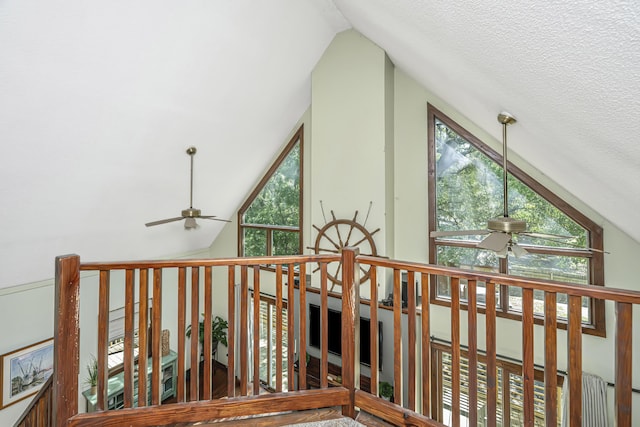 2468 Marina Rd, Wadmalaw Island, SC 29487 - hallway featuring vaulted ceiling, an upstairs landing, and a textured ceiling