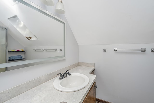 2468 Marina Rd, Wadmalaw Island, SC 29487 - bathroom featuring vaulted ceiling and vanity