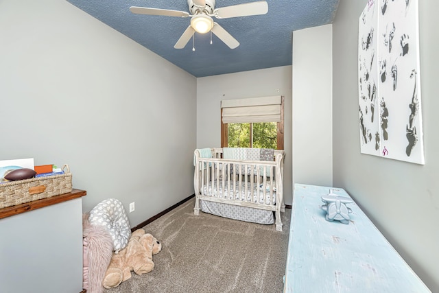 2468 Marina Rd, Wadmalaw Island, SC 29487 - carpeted bedroom featuring a crib, baseboards, and a ceiling fan