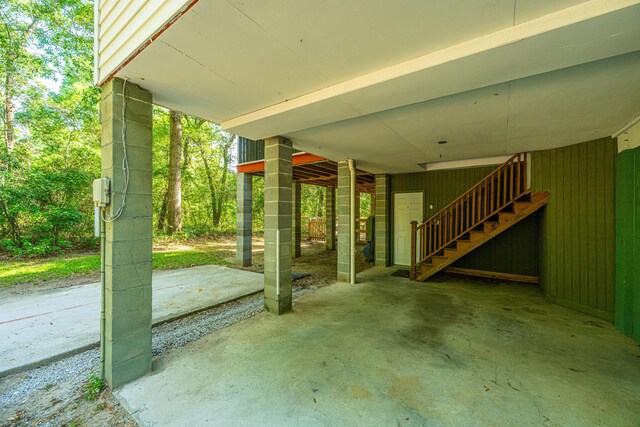 2468 Marina Rd, Wadmalaw Island, SC 29487 - view of patio featuring stairway and a carport