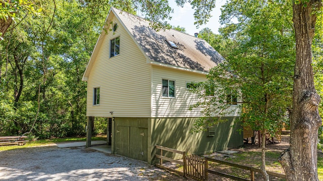 2468 Marina Rd, Wadmalaw Island, SC 29487 - view of side of property featuring a shingled roof
