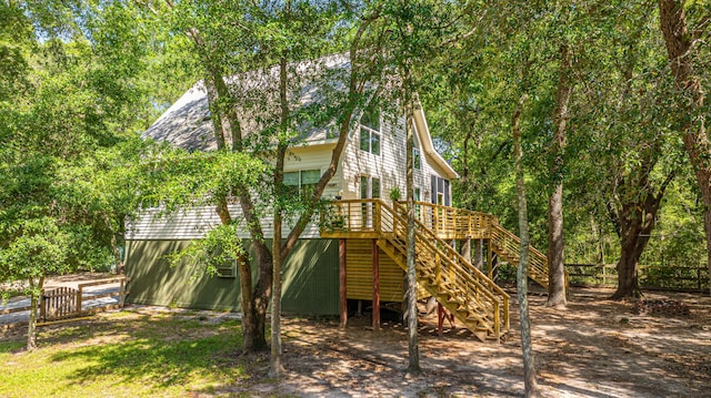 2468 Marina Rd, Wadmalaw Island, SC 29487 - view of jungle gym featuring fence, stairs, and a wooden deck