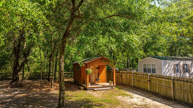 2468 Marina Rd, Wadmalaw Island, SC 29487 - view of shed with a fenced backyard