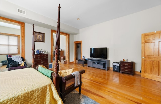 bedroom with wood-type flooring