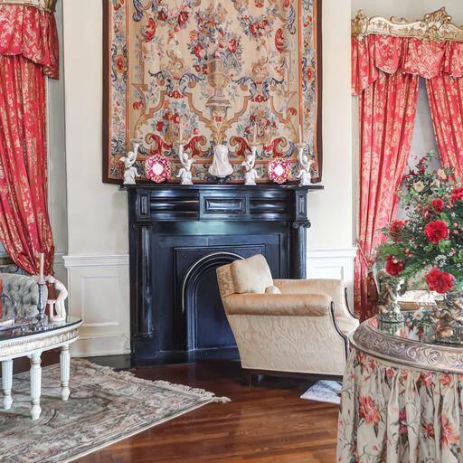81 Rutledge Ave, Charleston, SC 29401 - sitting room with a decorative wall, a fireplace, wainscoting, and wood finished floors