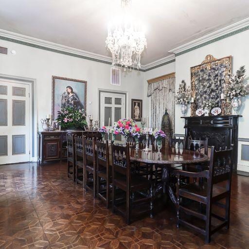 81 Rutledge Ave, Charleston, SC 29401 - dining space featuring a chandelier and ornamental molding