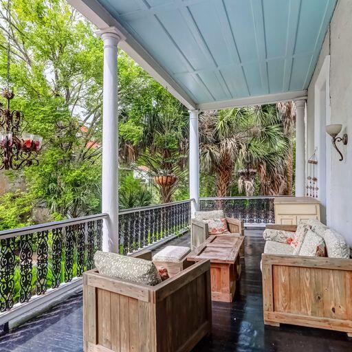 81 Rutledge Ave, Charleston, SC 29401 - wooden deck featuring outdoor lounge area