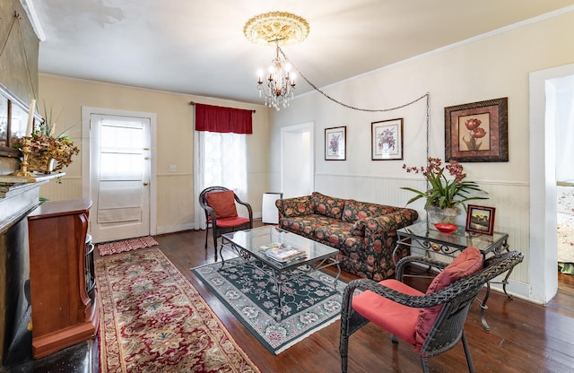 81 Rutledge Ave, Charleston, SC 29401 - living area with a wainscoted wall, a chandelier, wood finished floors, and ornamental molding