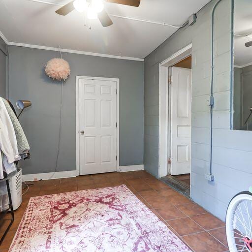81 Rutledge Ave, Charleston, SC 29401 - bathroom with a ceiling fan, tile patterned floors, and ornamental molding