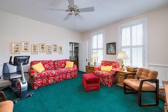 living room with carpet, ceiling fan, and radiator heating unit