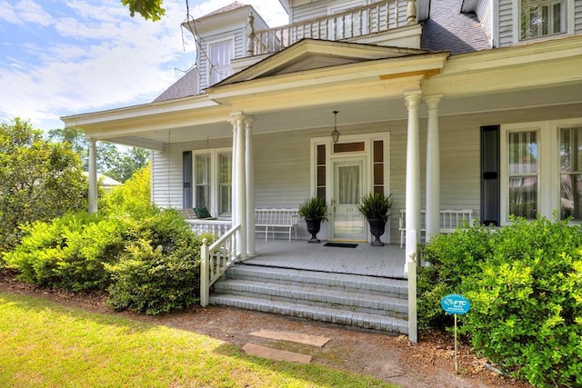 property entrance featuring covered porch