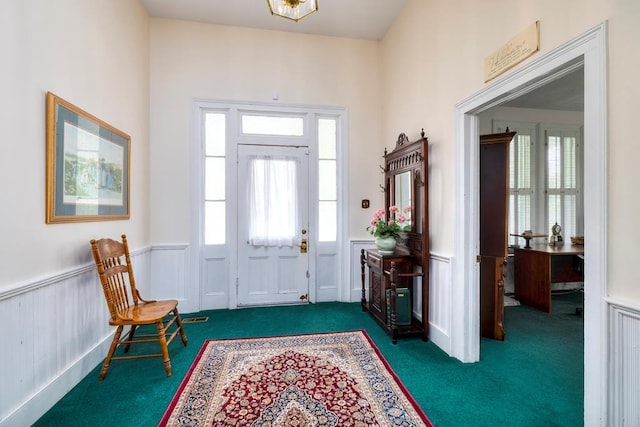 view of carpeted foyer