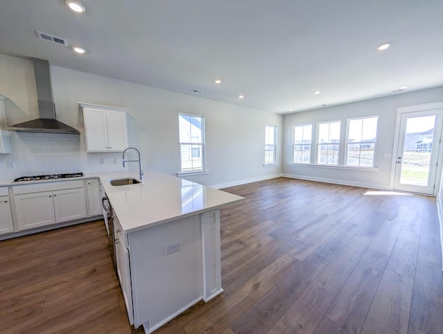 444 Parish Farms Dr, Summerville, SC 29486 - kitchen featuring wall chimney range hood, dark wood finished floors, healthy amount of natural light, and recessed lighting