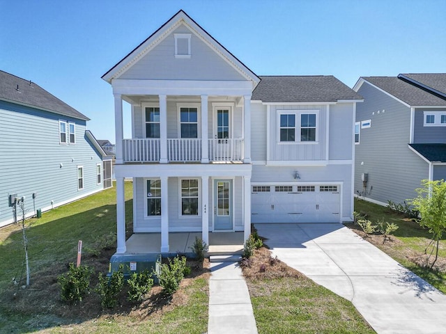 444 Parish Farms Dr, Summerville, SC 29486 - view of front facade featuring a porch, concrete driveway, a balcony, a front yard, and an attached garage