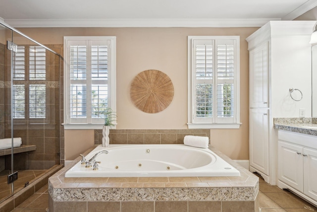 full bathroom featuring a tub with jets, a shower stall, vanity, and crown molding