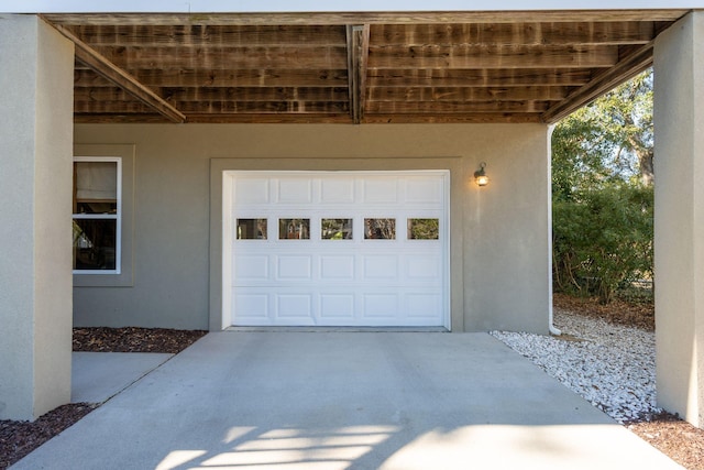 garage with driveway