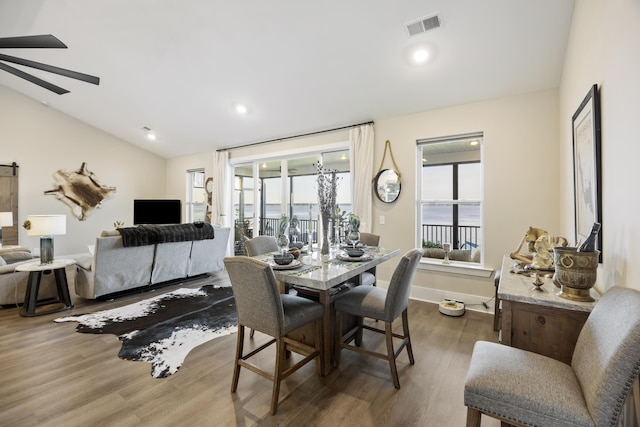 359 Green St, Santee, SC 29142 - dining area featuring dark wood-style floors, ceiling fan, vaulted ceiling, and recessed lighting