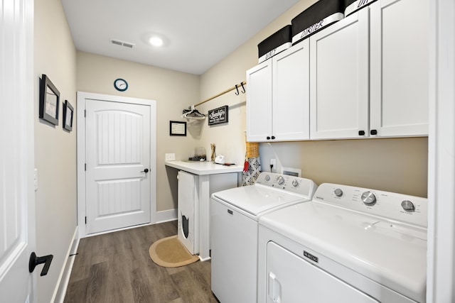 359 Green St, Santee, SC 29142 - laundry area featuring cabinet space, washer and clothes dryer, and dark wood-style flooring