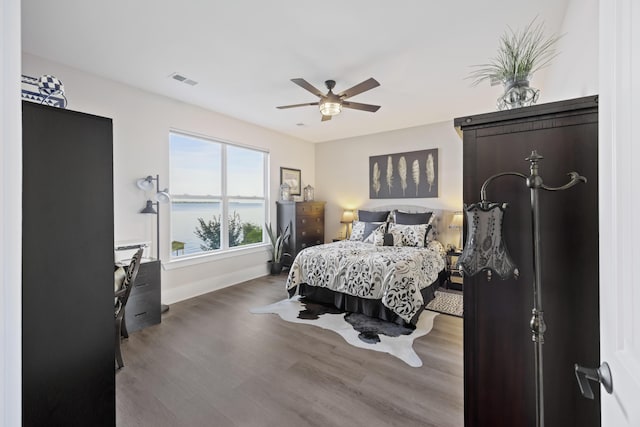 359 Green St, Santee, SC 29142 - bedroom featuring wood finished floors, ceiling fan, and a water view
