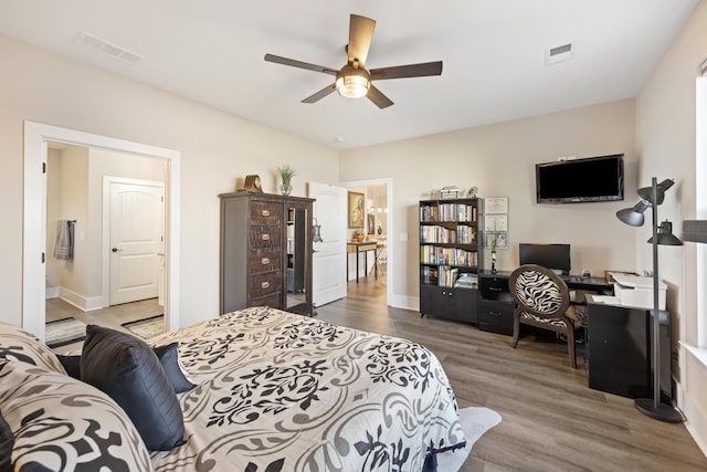359 Green St, Santee, SC 29142 - bedroom with wood finished floors, a desk, and ceiling fan