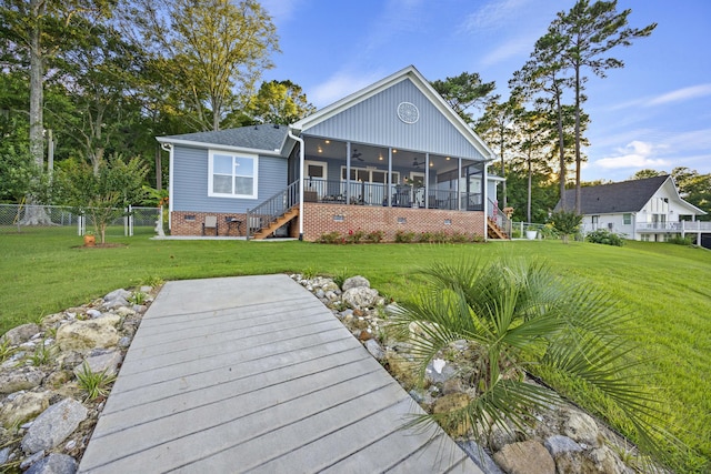 359 Green St, Santee, SC 29142 - back of house featuring a sunroom, stairs, ceiling fan, and crawl space