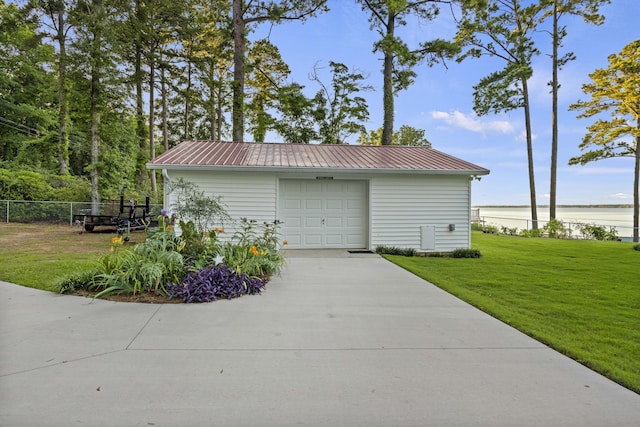359 Green St, Santee, SC 29142 - garage with driveway and a water view