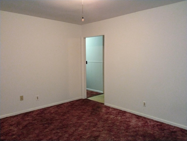 empty room featuring carpet flooring