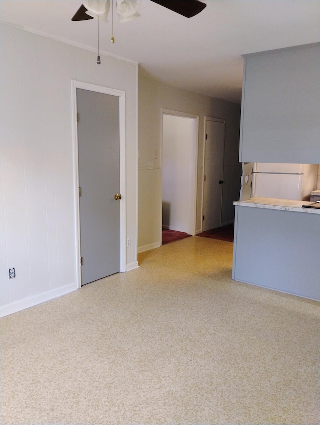 spare room featuring ceiling fan