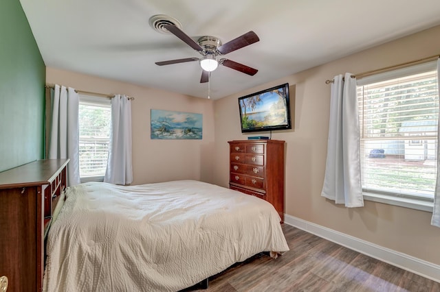 403 Forest Cir, Summerville, SC 29483 - bedroom with baseboards, ceiling fan, and wood finished floors