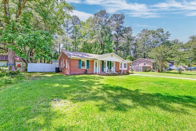 403 Forest Cir, Summerville, SC 29483 - ranch-style house featuring fence, brick siding, a porch, a front yard, and central air condition unit