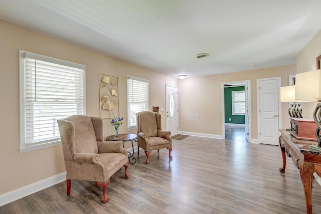 403 Forest Cir, Summerville, SC 29483 - living area featuring a healthy amount of sunlight, baseboards, and wood finished floors