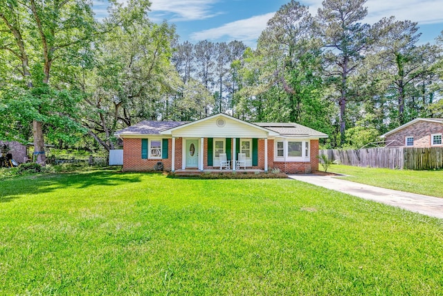 403 Forest Cir, Summerville, SC 29483 - ranch-style house featuring fence, covered porch, a front yard, brick siding, and concrete driveway