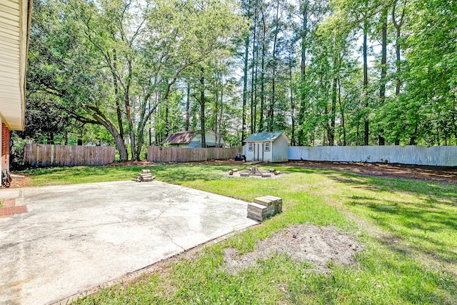 403 Forest Cir, Summerville, SC 29483 - view of yard featuring an outdoor structure, a fenced backyard, a patio area, and a shed