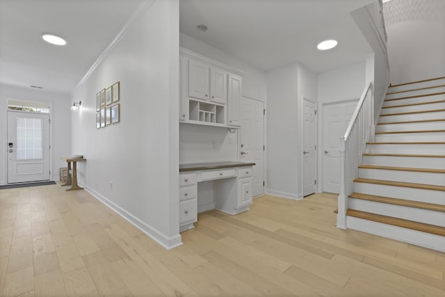 132 Fresh Meadow Ln, Mount Pleasant, SC 29466 - corridor with stairway, light wood-style flooring, a desk, recessed lighting, and crown molding