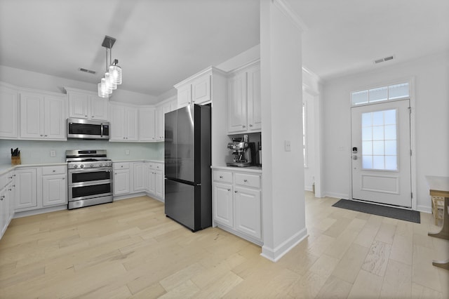 132 Fresh Meadow Ln, Mount Pleasant, SC 29466 - kitchen with appliances with stainless steel finishes, light countertops, and white cabinetry