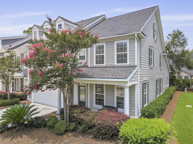 132 Fresh Meadow Ln, Mount Pleasant, SC 29466 - view of front of home featuring a shingled roof, a porch, driveway, and a garage