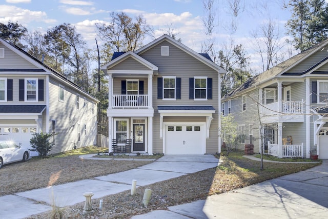 view of property featuring a garage and a balcony