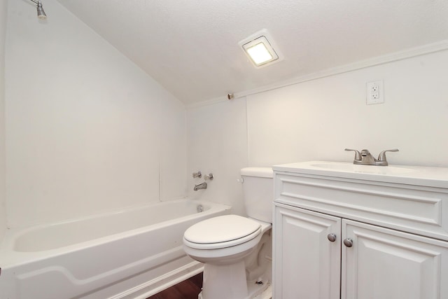 bathroom featuring vanity, lofted ceiling, hardwood / wood-style flooring, toilet, and a textured ceiling