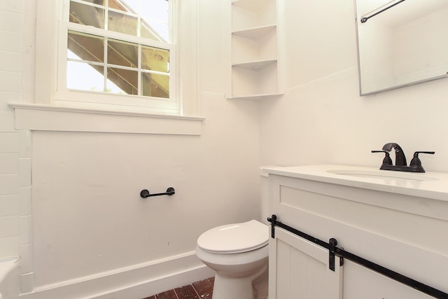 bathroom with wood-type flooring, vanity, toilet, and walk in shower